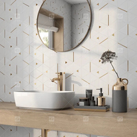 Nouveauté : mosaïque triangulaire en pierre de marbre de luxe avec dosseret de cuisine en acier inoxydable