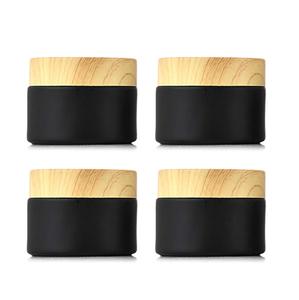 Wholesale <b>Large</b> Stock 20g 30g 50g 60g 100g Frosted Matte Black Round Glass Cream <b>Jar</b> Body Cream <b>Jar</b> with Wood Grain Cap - Product Image 1