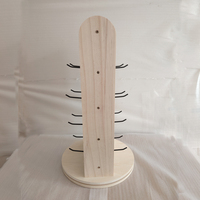 Présentoir rotatif double face en bois pour panneau perforé avec crochets pour l'affichage de marchandises