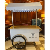 Yicheng Offre Spéciale personnalisé chariot à bonbons chariot de vente chariot d'affichage des aliments chariot avec roues pour les entreprises
