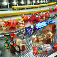 Rollo de película de doble giro de PET metalizado de PVC de alta calidad para embalaje de dulces y chocolate para alimentos de caramelo y confitería