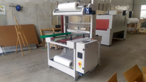 Machine d'emballage automatique de manchons en film rétractable en ligne droite UXF-6030A - Product Image 5