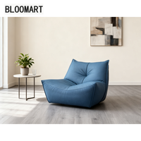 Chaise longue en cuir Chaise d'appoint moderne avec rembourrage en éponge et ouate de coton Cadre en bois avec base pivotante noire