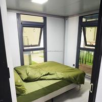 Maison préfabriquée de luxe pliable de 20 pieds, maison conteneur extensible à deux ailes, maison modulaire moderne à 2 chambres, mini-maison mobile, pod de vie mobile