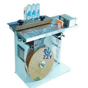Máquina automática de sellado y etiquetado de cajas adhesivas transparentes