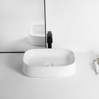 Vasque de salle de bain en céramique de haute qualité, blanche brillante, facile à nettoyer, fabriquée en Chine