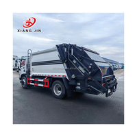 Camion à ordures compacteur diesel à transmission manuelle 4x2 pour le transport et la collecte des déchets, le cœur du système comprend le moteur