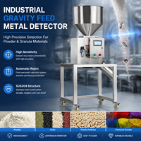 Détecteur de métaux à alimentation par gravité à haute sensibilité pour poudre et granulés avec système d'éjection automatique