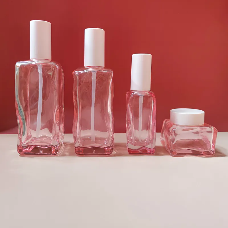 ピンクセラムガラスボトルカスタムロゴフェイスクリームジャースキンケアセットピンクガラス容器化粧品包装ファンデーションボトル