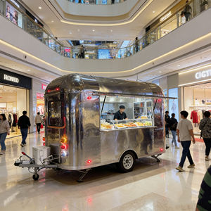 ออกแบบมาเพื่อความโค้งมนอย่างอ่อนโยน รถเข็นขายอาหารเคลื่อนที่สแตนเลสสตีลนี้โดดเด่นสำหรับการดำเนินงานขายอาหารริมทางในยามค่ำคืนในเมือง - Product Image 3