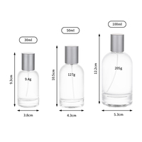 Flacon de parfum personnalisé en verre cylindrique 30ml 50ml 100ml avec pulvérisateur à brume et épaule ronde