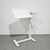 Bureau de travail moderne à hauteur réglable avec vérin pneumatique à colonne unique, plateau pliable et roulettes dissimulées pour bureau et chambre
