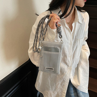 Conception évidée la plus populaire femmes décontracté minimaliste téléphone porte-monnaie sac à bandoulière léger mini sac à bandoulière
