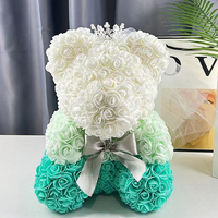 Vente chaude 2024 cadeaux de noël à la main éternelle Rose ours Rose artificielle ours en peluche avec boîte robe de mariée couronne