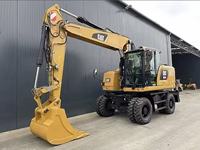 Excavatrice sur roues Caterpillar M318F d'occasion, godet de 0,91 m³, vitesse routière de 35 km/h, excellent état, directement de l'usine