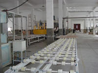 Machine de fabrication de dalles de pierre artificielle