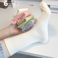 Chaussettes décontractées d'hiver en coton blanc taille unique pour femmes, antibactériennes, longueur mi-mollet, avec logo sur le revers
