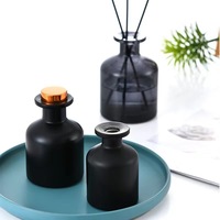 Vente en gros de verre noir mat ambré de luxe pour diffuseur de roseaux de 50ml à 250ml en forme de cylindre avec bouchons en caoutchouc