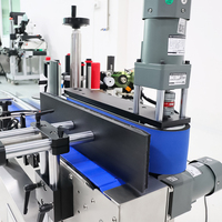 Machine d'étiquetage automatique pour bouteilles et contenants |   Applicateur d'étiquettes adhésives rapide et précis