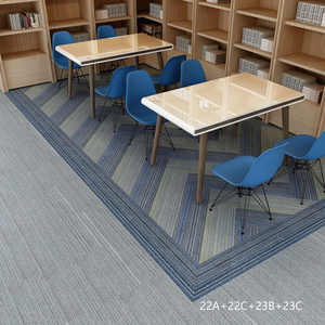 Dalles de moquette de luxe modernes de style puzzle 50x50cm grises antidérapantes avec dos en PVC ignifuges écologiques en nylon PP pour le bureau et la maison - Product Image 1