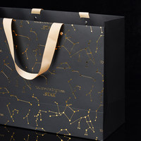 Sac de shopping de luxe en papier noir haut de gamme avec estampage à chaud motif constellation et poignée en ruban pour emballage cadeau bijoux et produits de beauté