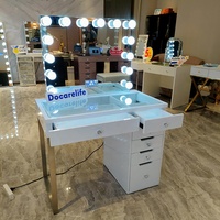 Docarelife Stock aux États-Unis Coiffeuse BT moderne pour chambre à coucher avec miroir éclairé à ampoules et plateau en verre
