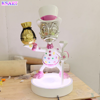 Sculpture en résine de fibre de verre colorée électroplaquée Donald Duck, sac d'argent dollar haut de gamme, modèle artistique peint à la main, personnalisable Ksart