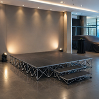 Plateforme de scène pliable en aluminium noire antidérapante pour événements, conférences, expositions, spectacles