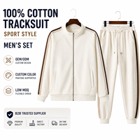 Ensemble de survêtement blanc personnalisé avec logo OEM, veste zippée et pantalon de jogging avec bandes latérales marron et poches avant pour les marques de mode