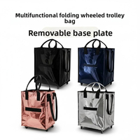 Sac de voyage pliable en PP tissé avec logo personnalisé, grande capacité, imperméable, avec roulettes et poignée pour les voyages