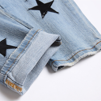 Jean slim bleu pour homme, effet usé, avec patch en cuir personnalisé, en denim extensible, style urbain, logo OEM