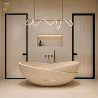 Baignoire ovale de luxe en marbre beige sculpté à la main, fournie directement par l'usine, pour la maison et les hôtels