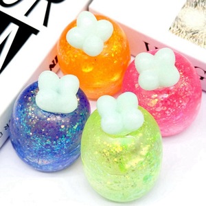 Jouet anti-stress pour enfants à rebond lent, mini-radis à presser quatre couleurs, à paillettes de maltose, thème Pâques - Product Image 1