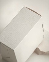 Emballage en papier cartonné blanc écologique de luxe personnalisé avec laminage mat et revêtement UV pour les produits de soin de la peau