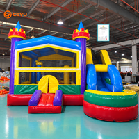 Château gonflable Ceyu avec tours d'angle, piscine à balles, toboggan et murs en filet pour location de fête d'anniversaire pour enfants