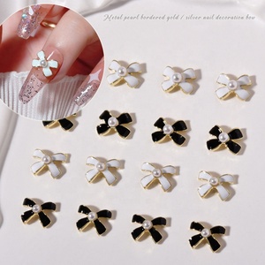 Perles en alliage 3D, nœud papillon, Style Simple, breloques pour Nail Art, arc <span class=keywords><strong>noir</strong></span> et blanc, 7x9mm, nœud papillon, <span class=keywords><strong>strass</strong></span> pour ongles, bricolage, Design de <span class=keywords><strong>manucure</strong></span> - Product Image 1