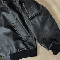 Veste à couches en cuir noir pour hommes à la mode Style motard à capuche avec fermeture éclair oblique et veste à poche poitrine pour homme