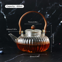 Théière en verre borosilicate résistant à la chaleur avec poignée en bois, design créatif en forme de citrouille, compatible avec les cuisinières à gaz