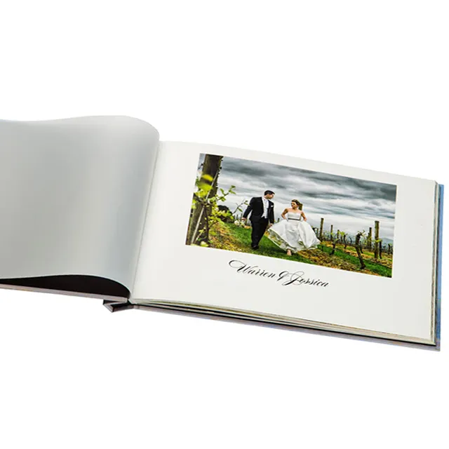 Buku album foto pernikahan desainer karizma