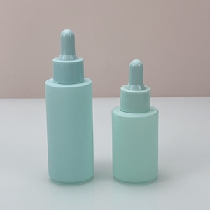 Ensemble d'emballages cosmétiques en gros pour soins de la peau, flacon compte-gouttes en verre bleu mat et tube en plastique bleu, en stock - Product Image 2