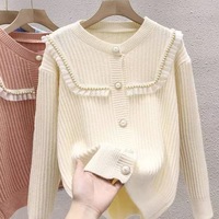 Cárdigan de un solo pecho de lujo para mujer Diseño elegante con cuello redondo Nuevo abrigo de invierno con estilo informal y logotipo frontal