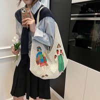 Nouvel arrivage à la mode estivale Sac à main shopping personnalisé mignon pour dame Sac à bandoulière de plage creux pour les vacances en bord de mer avec patch