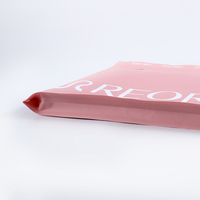 Vêtements en papier kraft blanc plastique biodégradable écologique vêtements rose mat emballage à fermeture éclair avec logo personnalisé sacs à fermeture éclair
