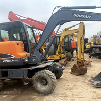 Excavatrice sur pneus DOOSAN DX60W-9C d'occasion avec une résistance éprouvée, achat rentable