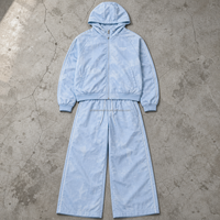 Ensemble décontracté bleu clair pour homme sur mesure avec pantalon large à cordon de serrage et passepoil blanc – Fabrication OEM/ODM