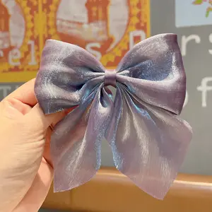 Nuevos dulces lazos horquilla pasadores Color sólido brillante Organza Bowknot pinzas para el cabello Clip de pico de pato para niñas accesorios para el cabello