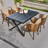 Ensemble de meubles de salle à manger d'extérieur pour hôtel ou villa, design moderne, noir, rectangulaire, pour 8 personnes, table et chaises