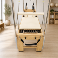 Machine de Pilates Cadillac Reformer portable en chêne sur mesure avec barre de pieds externe, table trapèze complète et boîte pour entraînement corporel en studio