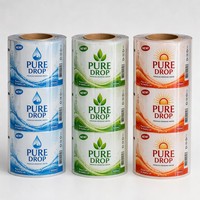 Rouleau de film alimentaire anti-poussière en LDPE pour jus, soda, eau minérale, sachets d'emballage de boissons imprimés en héliogravure personnalisés