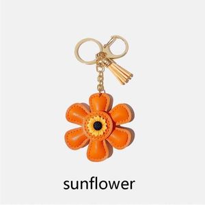 Online Wholesale Cute Cartoon <b>Personalized</b> Ins Pu Leather Sunflower <b>Keychain</b> for Bag Pendant and Creative Gift - Product Image 4